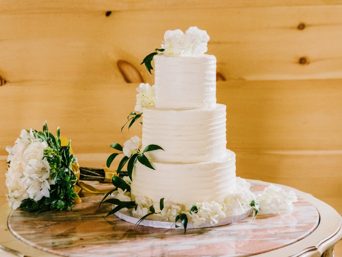 White wedding cake with florals