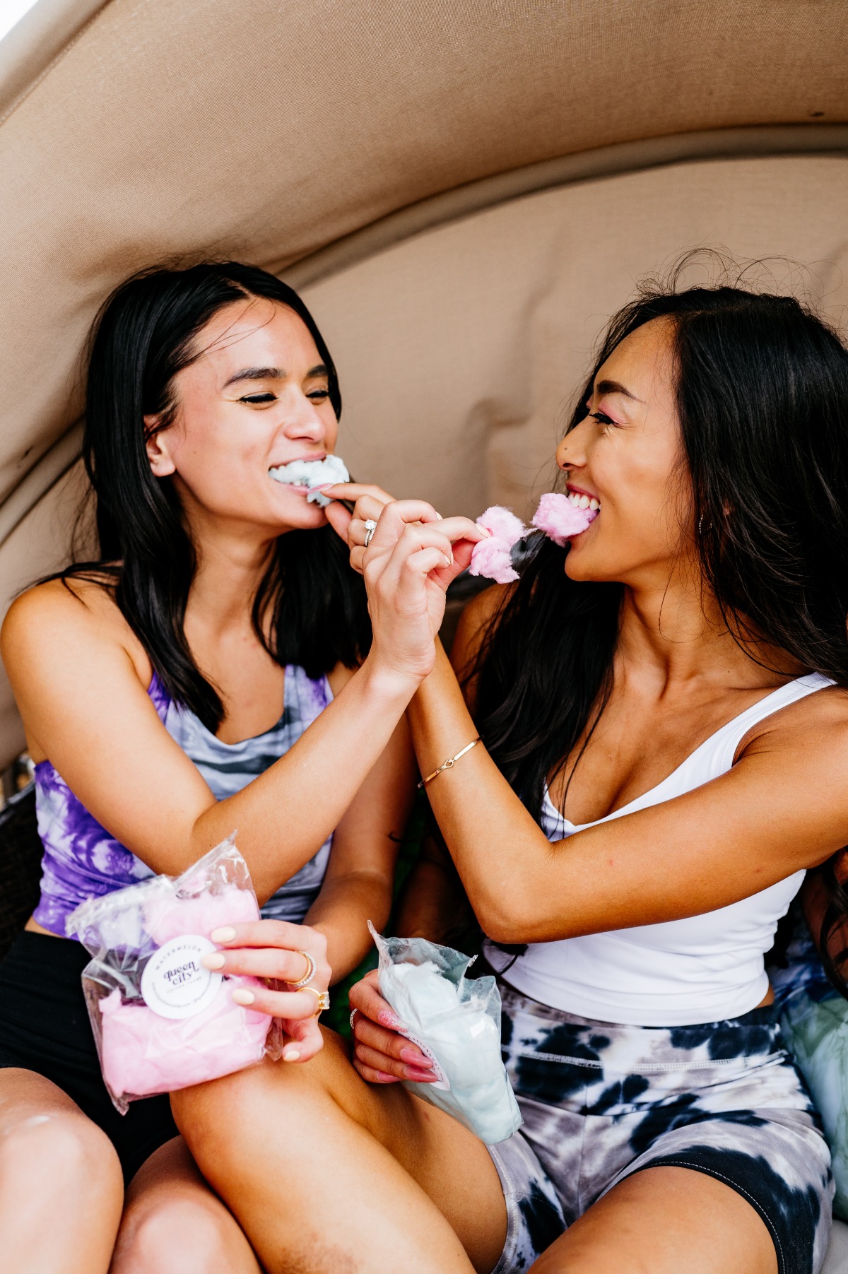 Two bachelorettes eating cotton candy