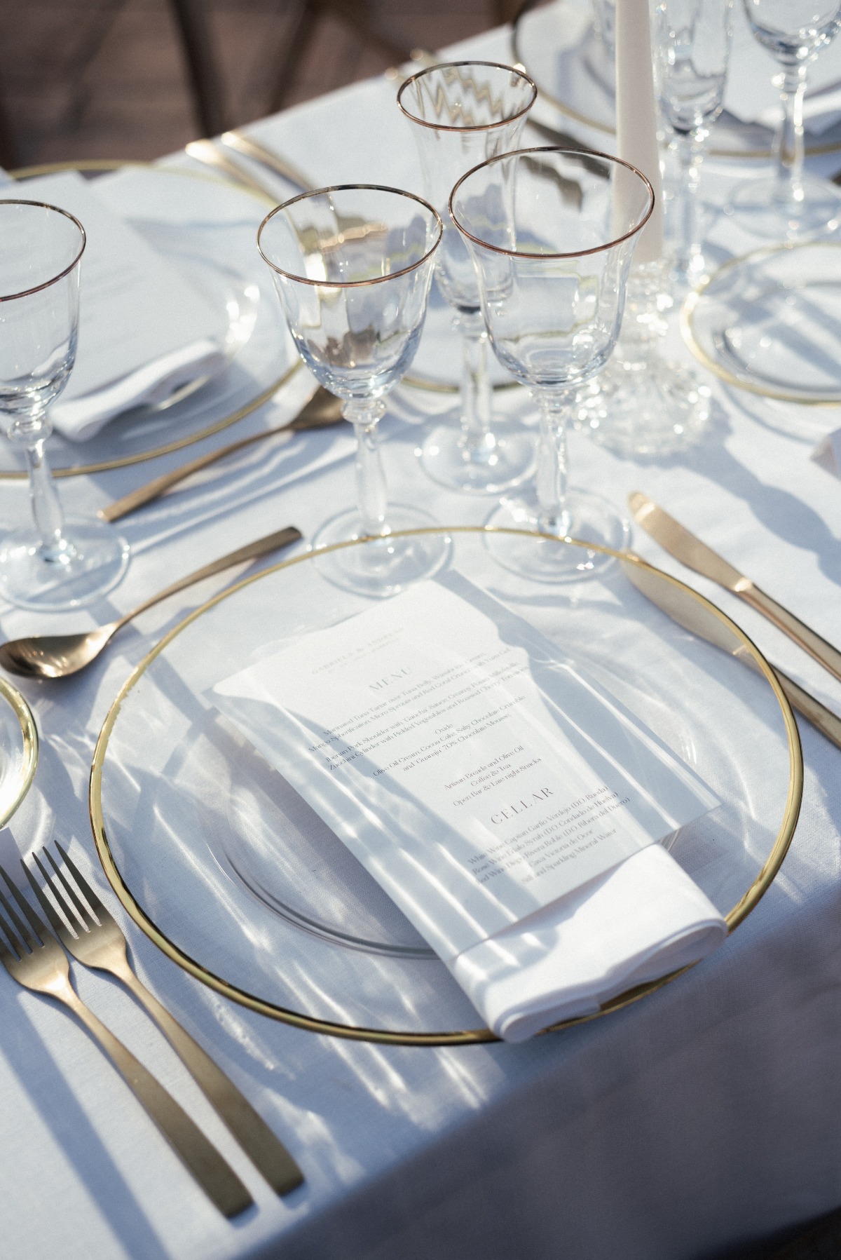 Close up of place setting and gold flatware