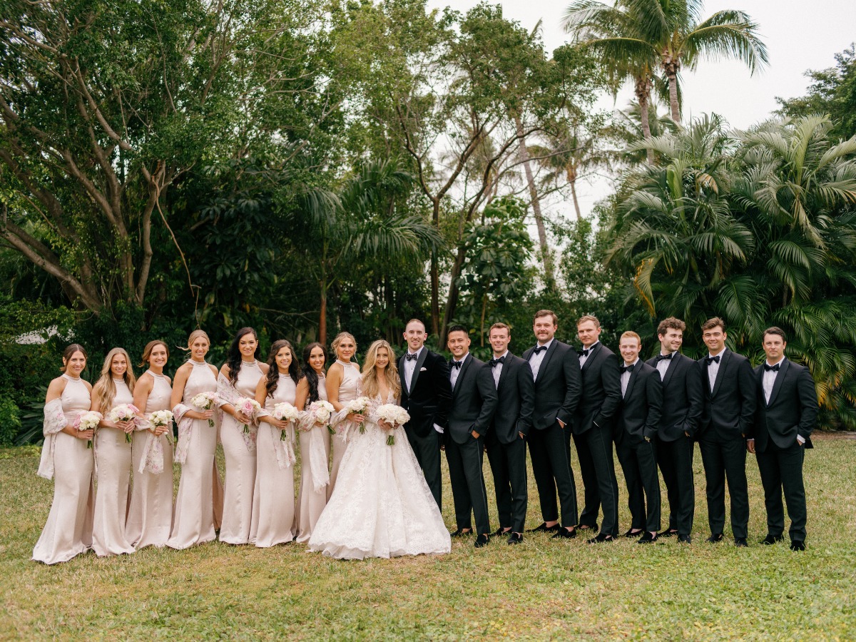 Portrait of bride, groom, and wedding party