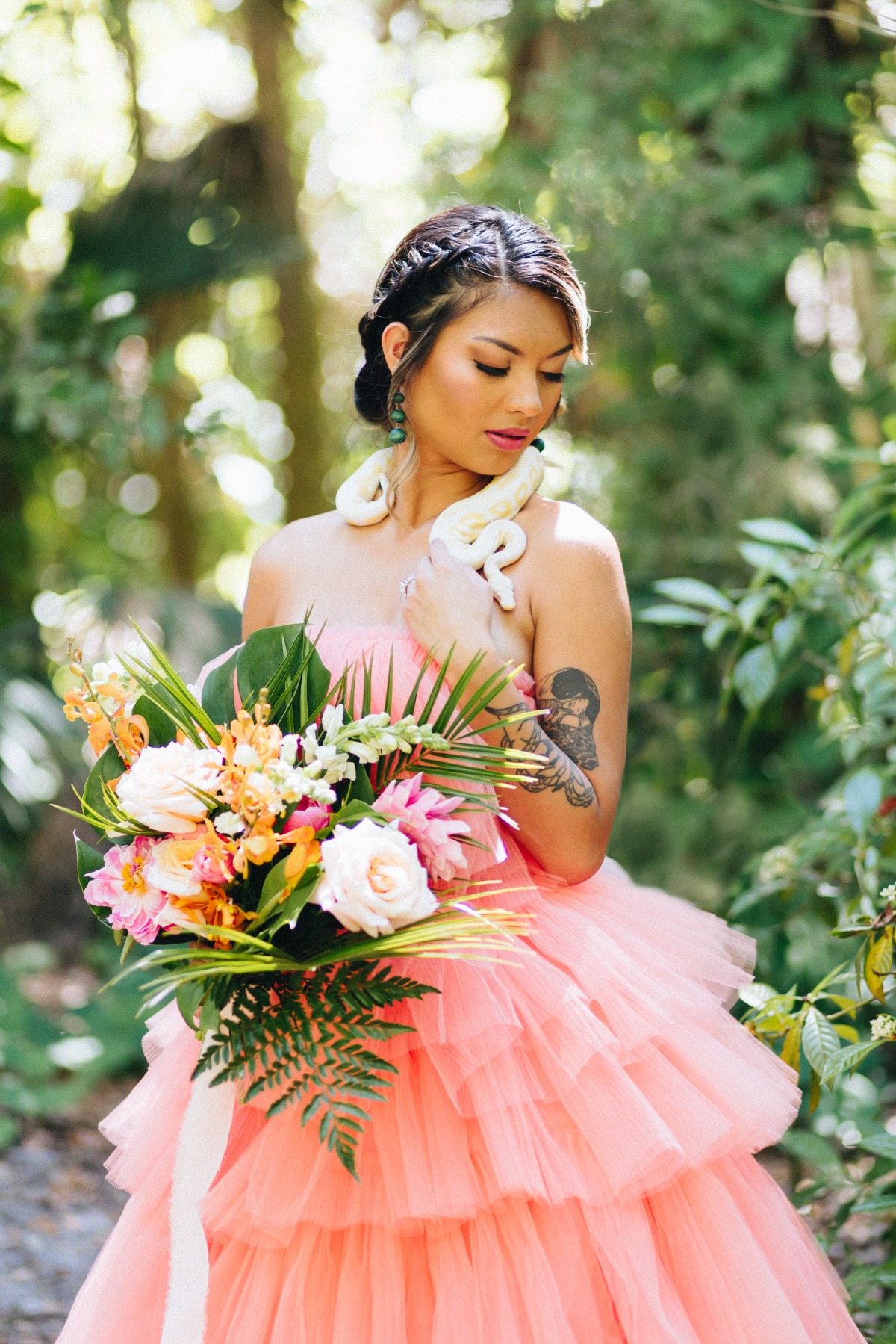 Bridal portrait with bouquet and snake