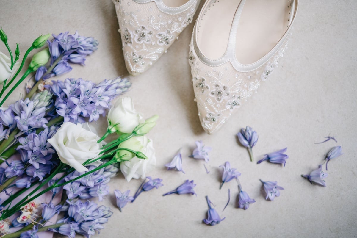 Aerial view of shoes and lilacs