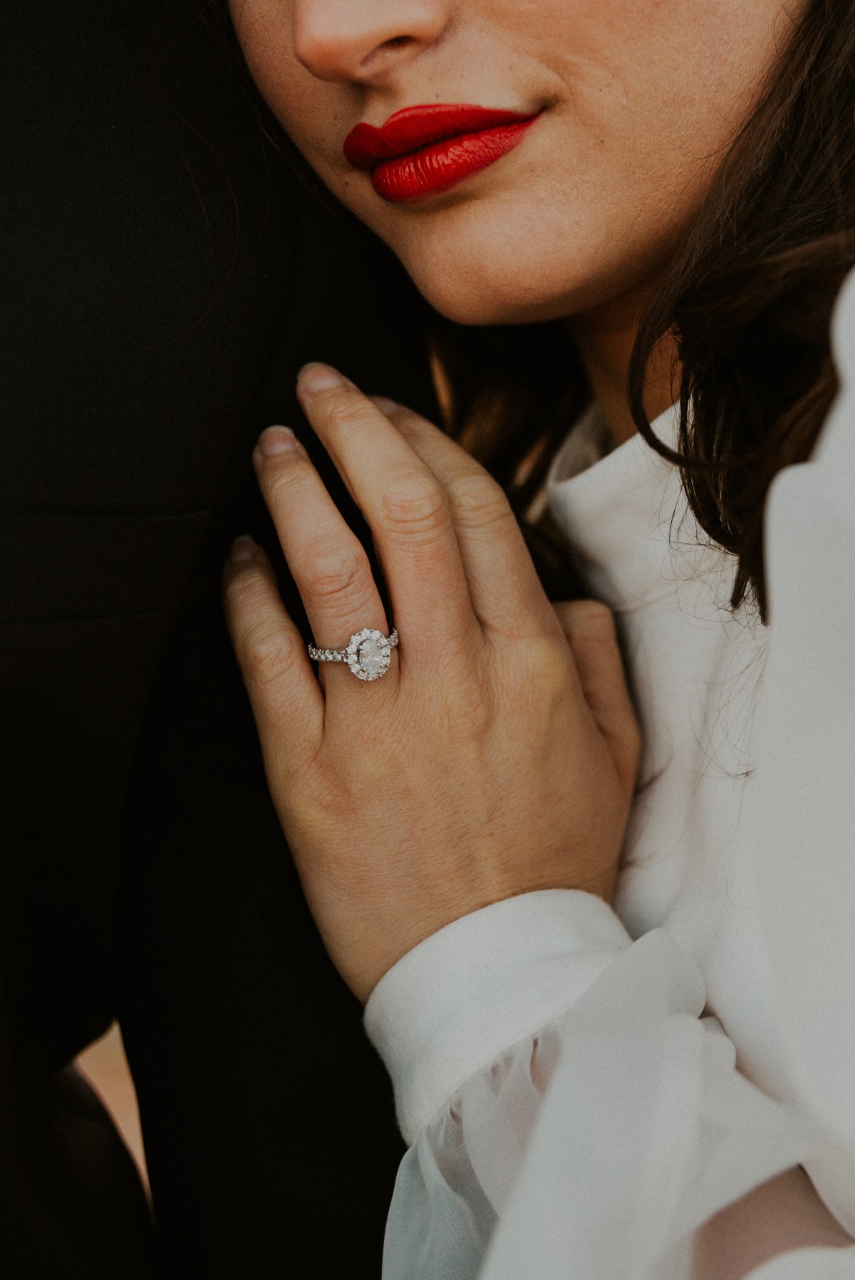 Portrait of bride's hand with engagement ring