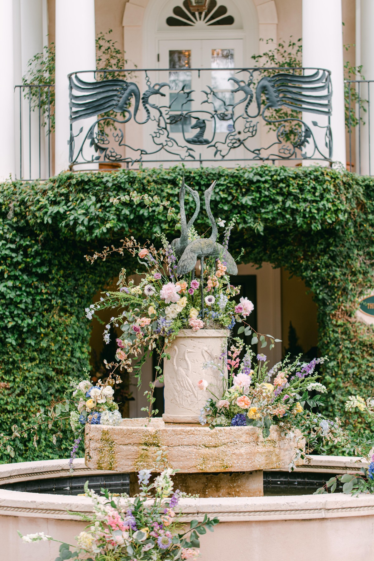 Floral covered fountain in ceremony space
