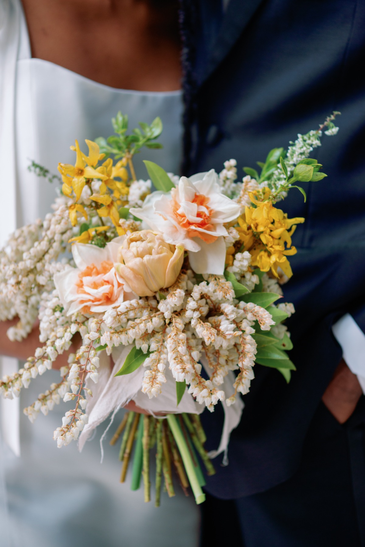 spring time wedding bouquet with daffodils