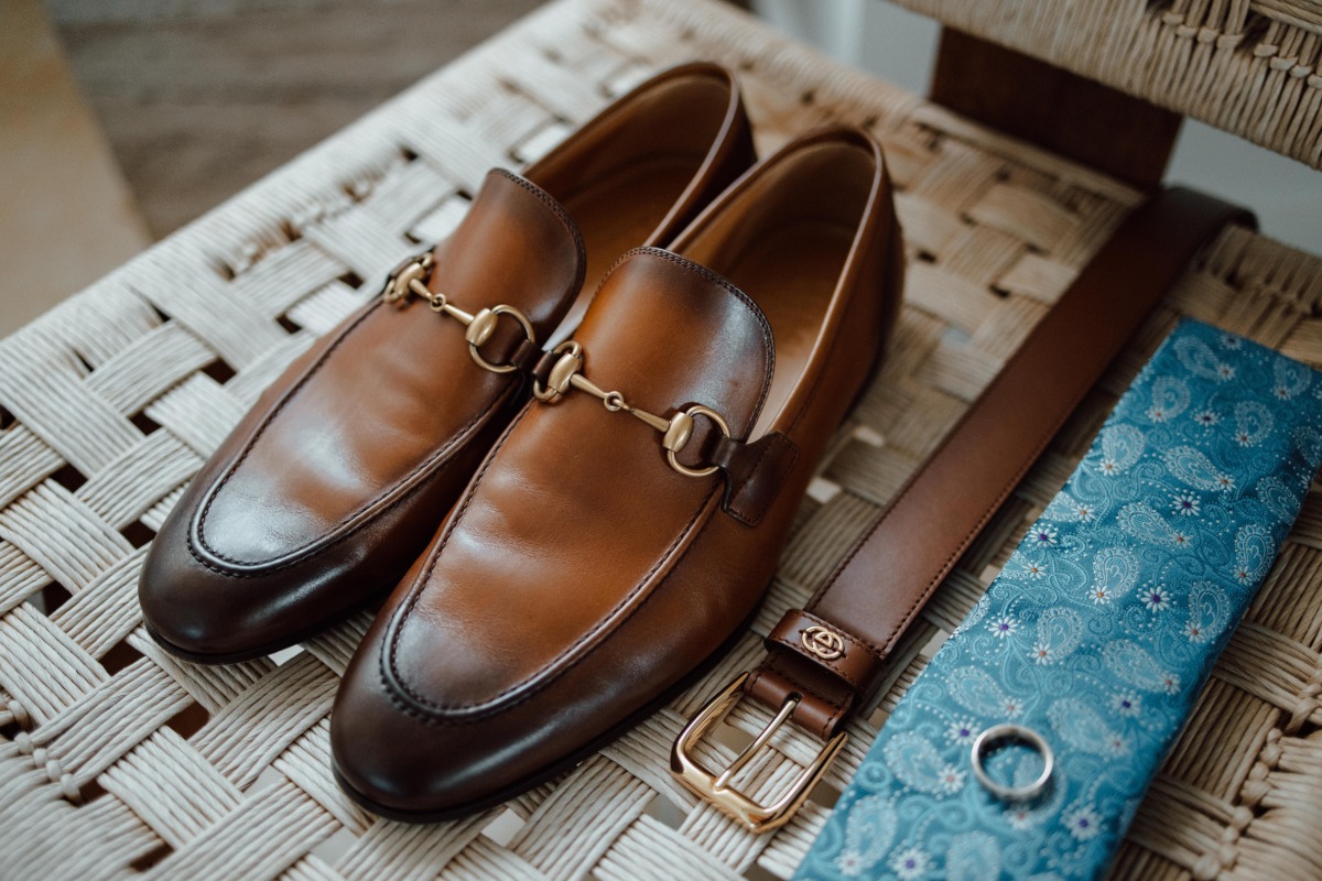 Groom's loafers, belt, and tie