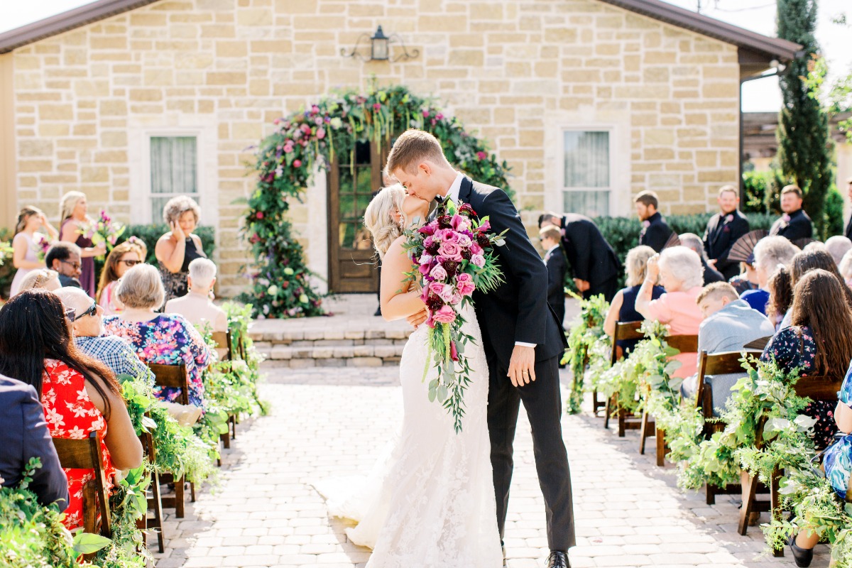 First Kiss at Vineyard Ceremony