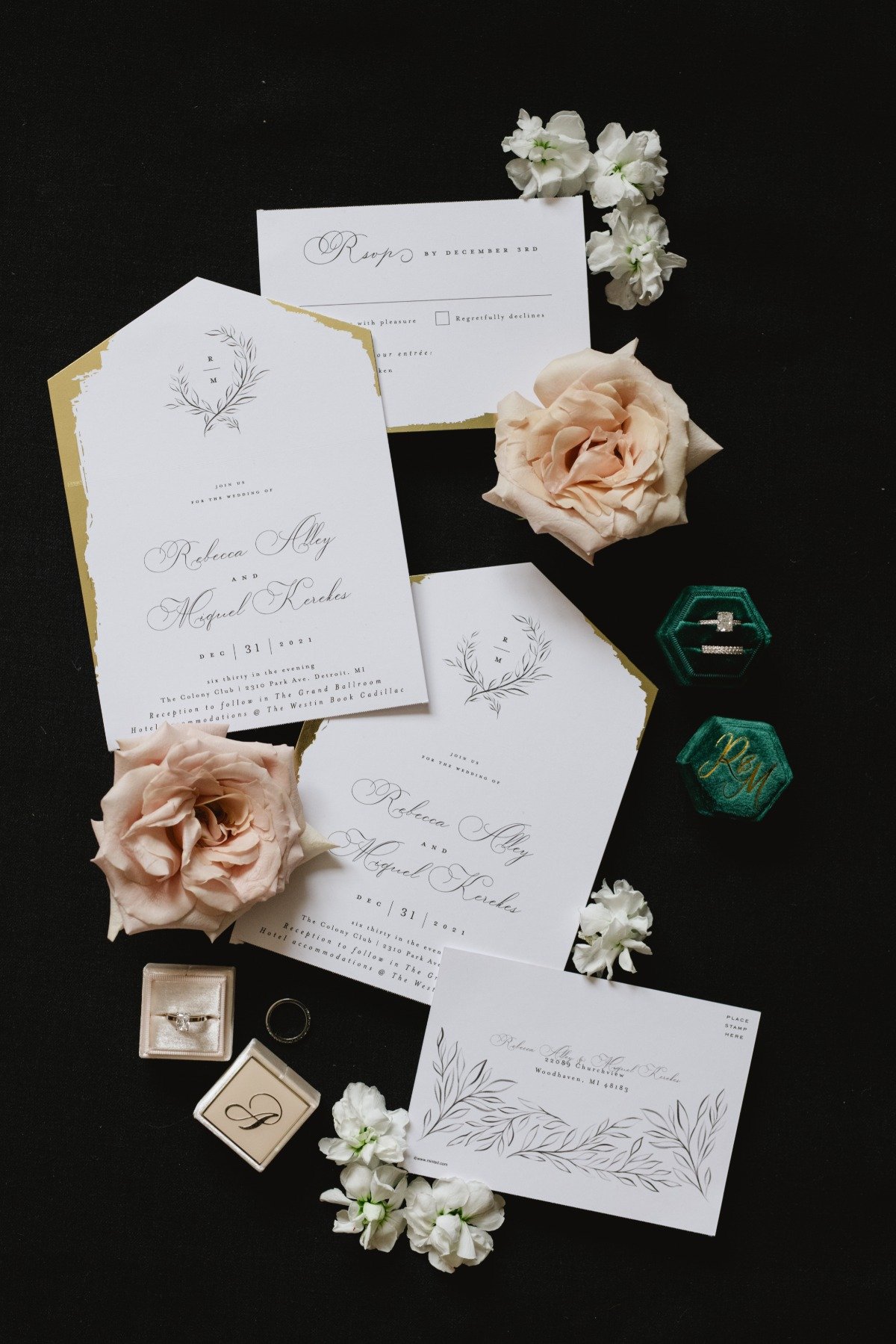 Aerial view of invitations with floral accents