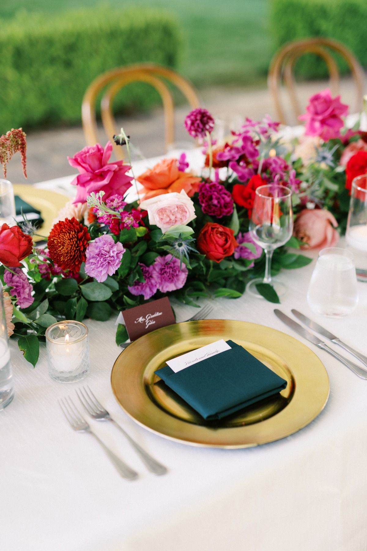 Close-up of place setting and table runner flowers