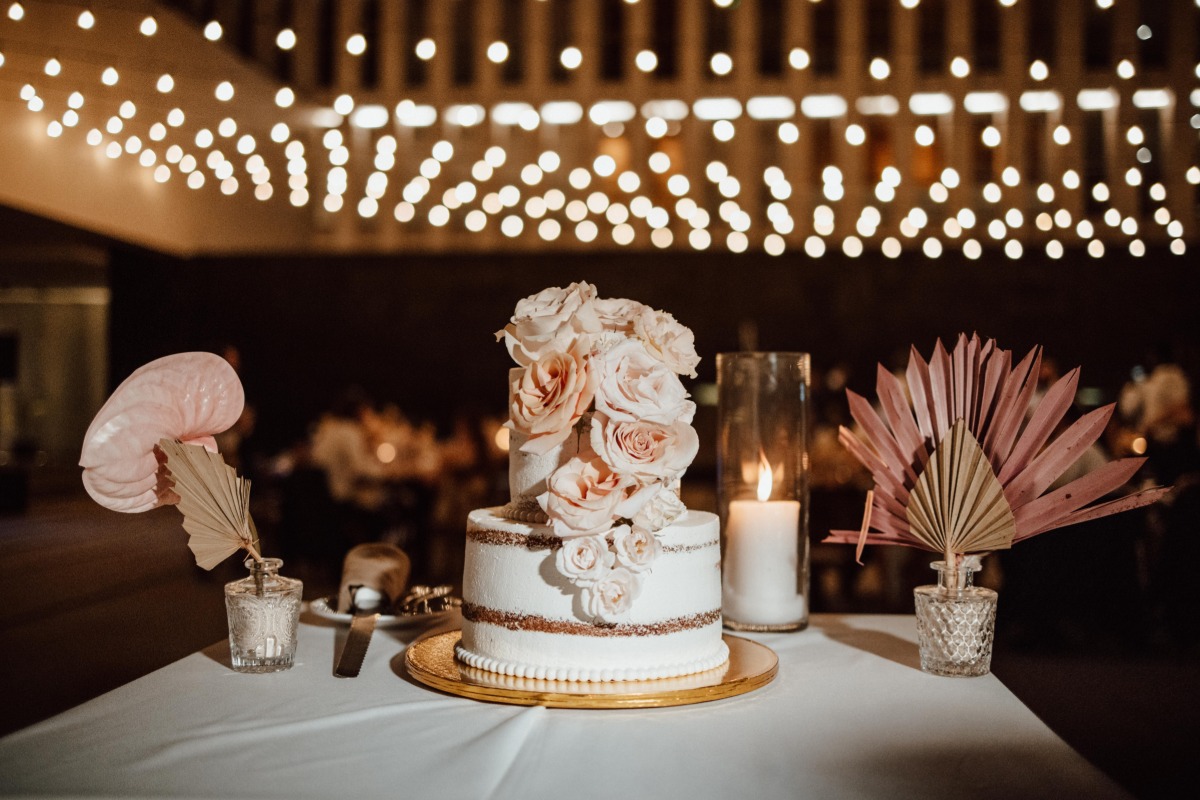 naked wedding cake with blush florals