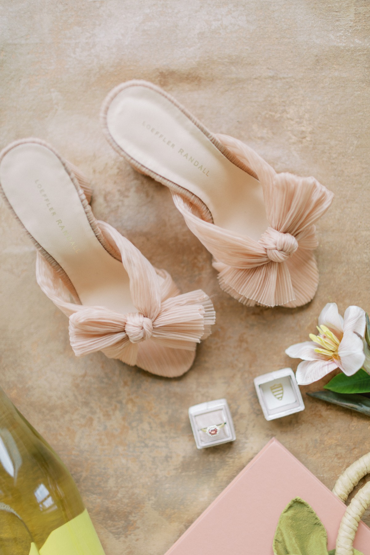 Aerial view of soft pink bridal shoes