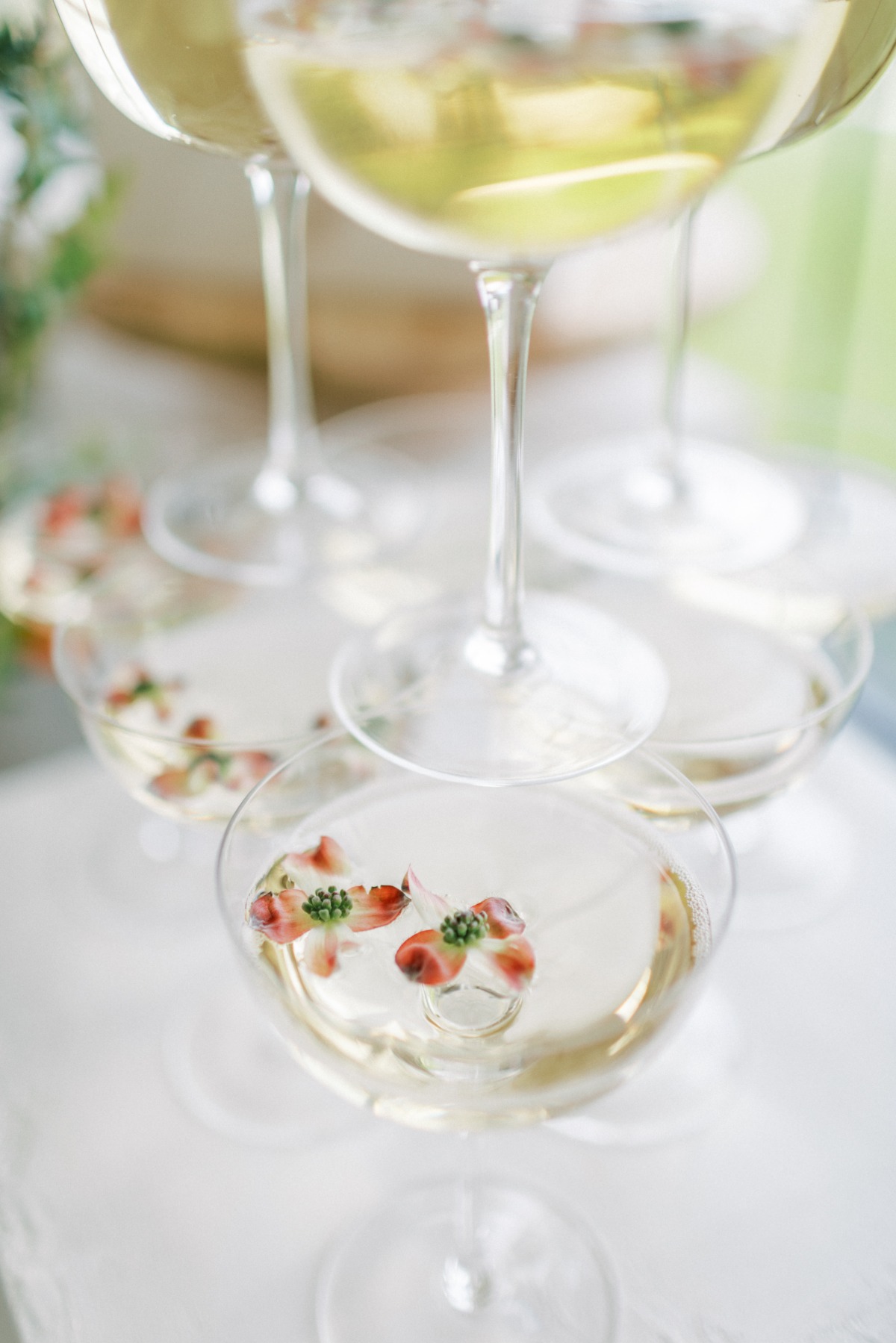 Champagne tower with floral embellishments