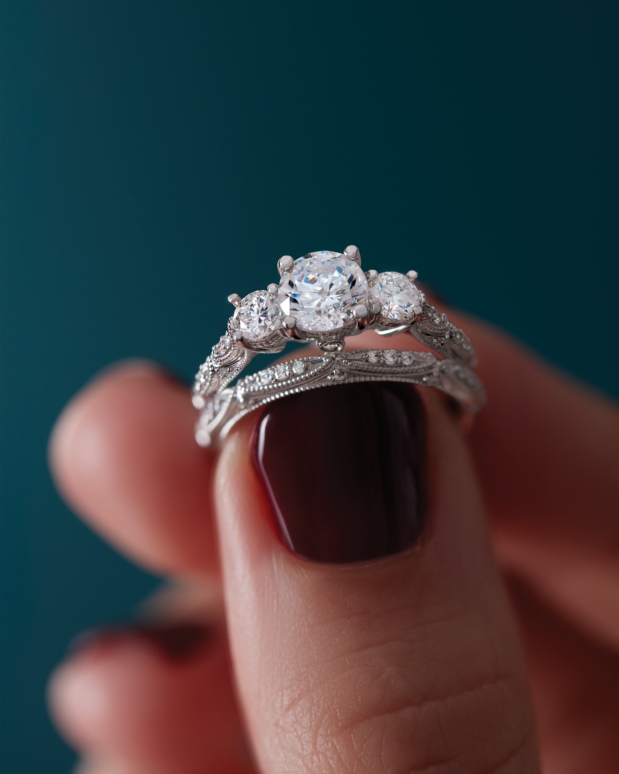 Platinum trinity engagement ring and vintage band