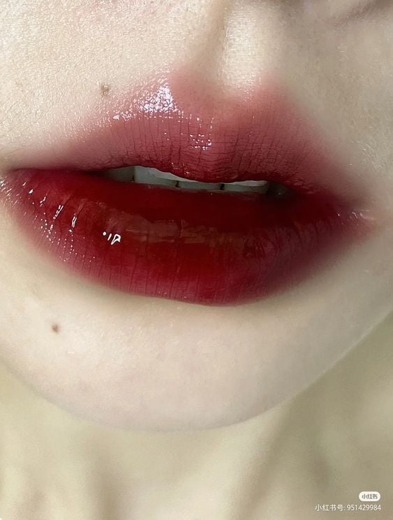 smudged burgundy lip