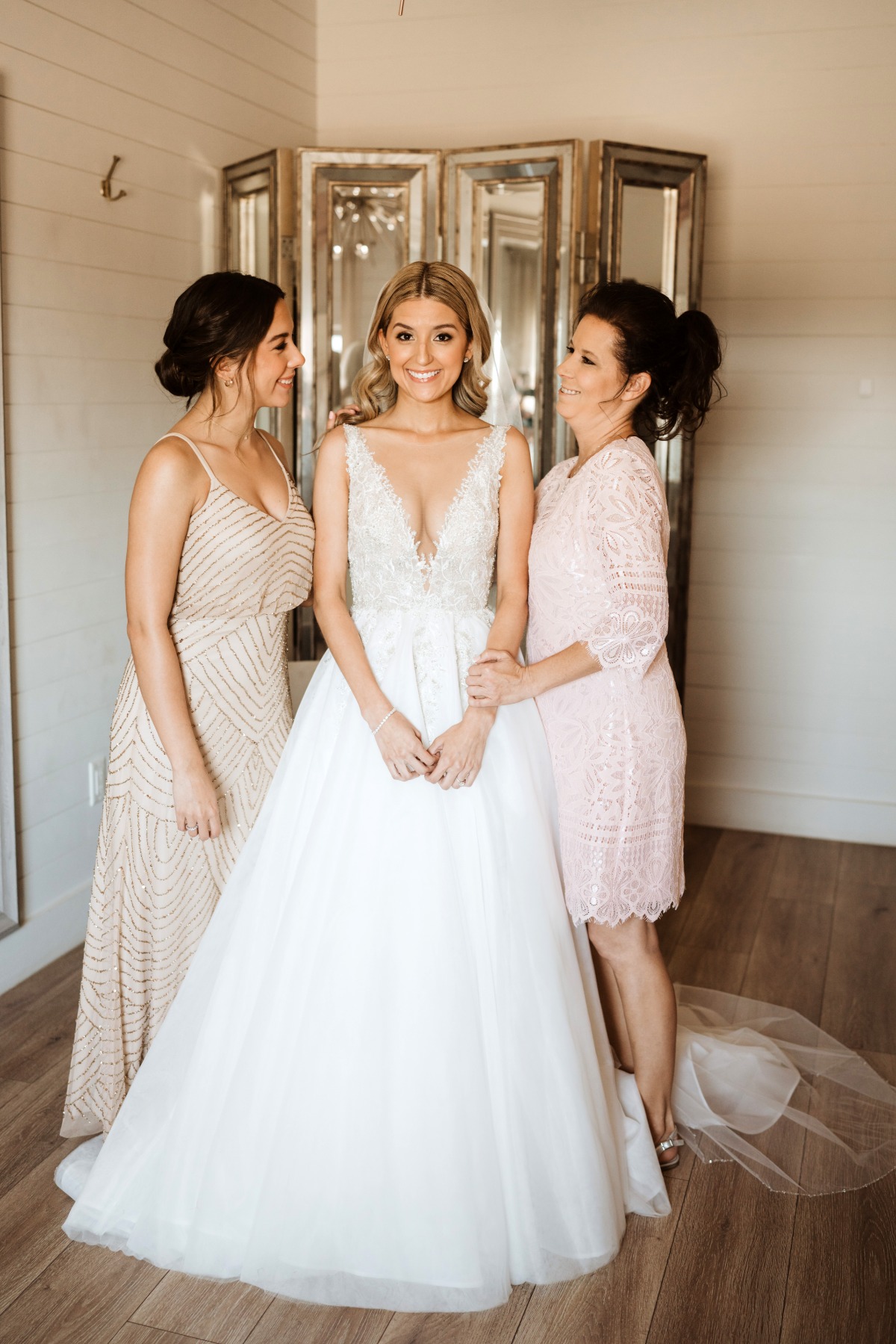 Bride Getting Ready with Mom and Sister