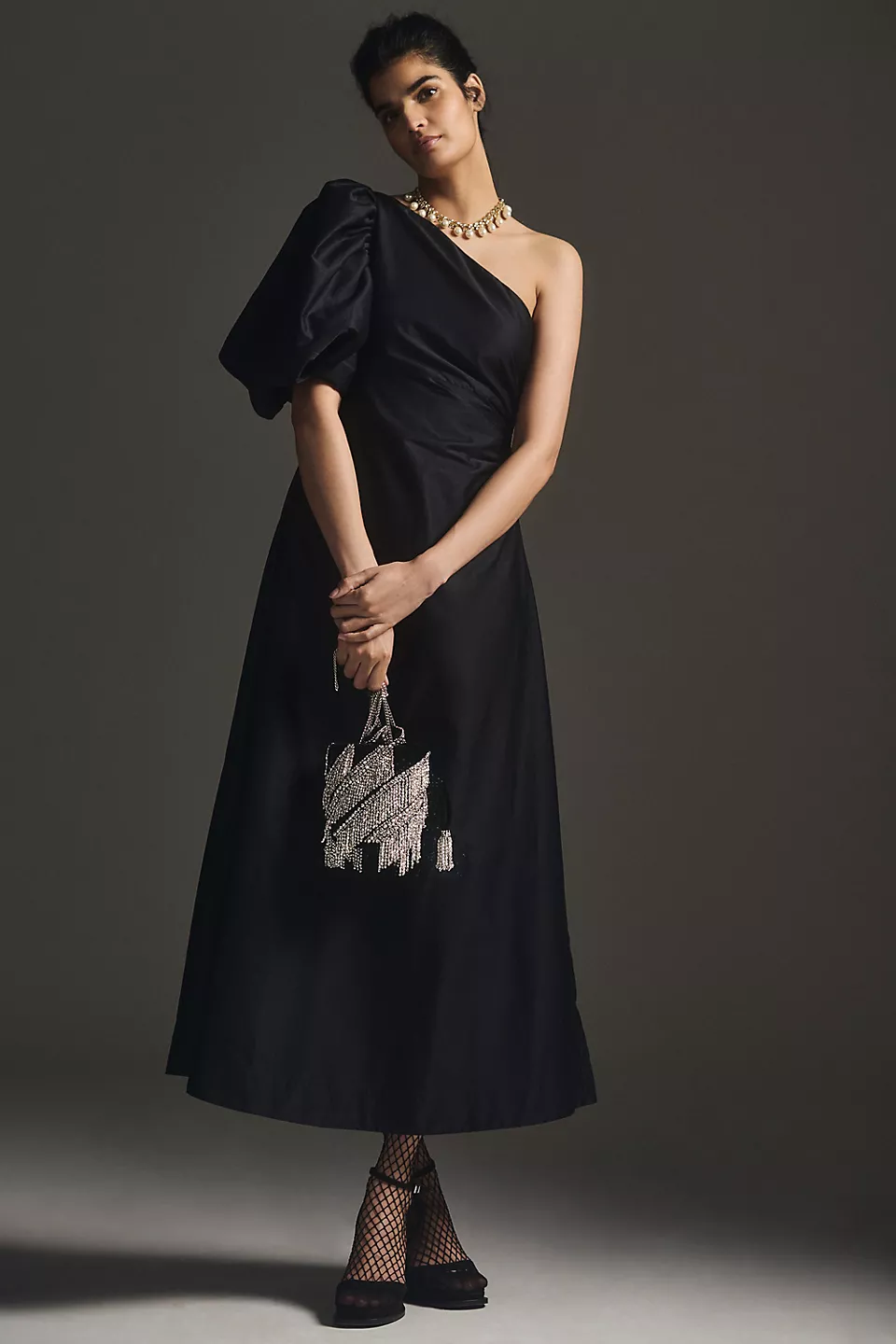 dramatic one-shouldered black cocktail dress