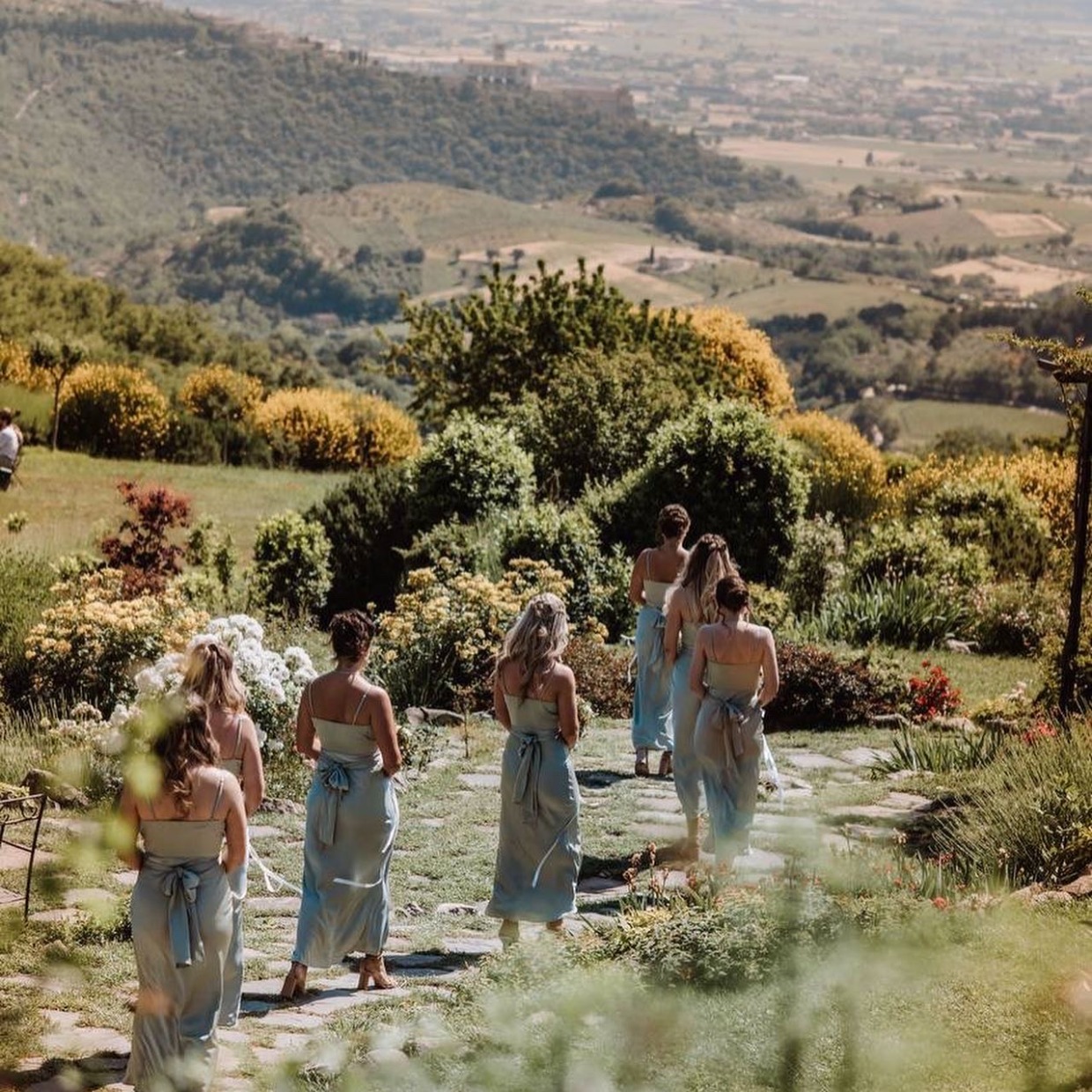 bridesmaids walking down