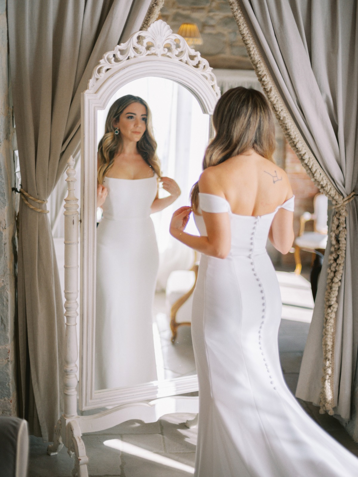the easiest way to button your wedding dress