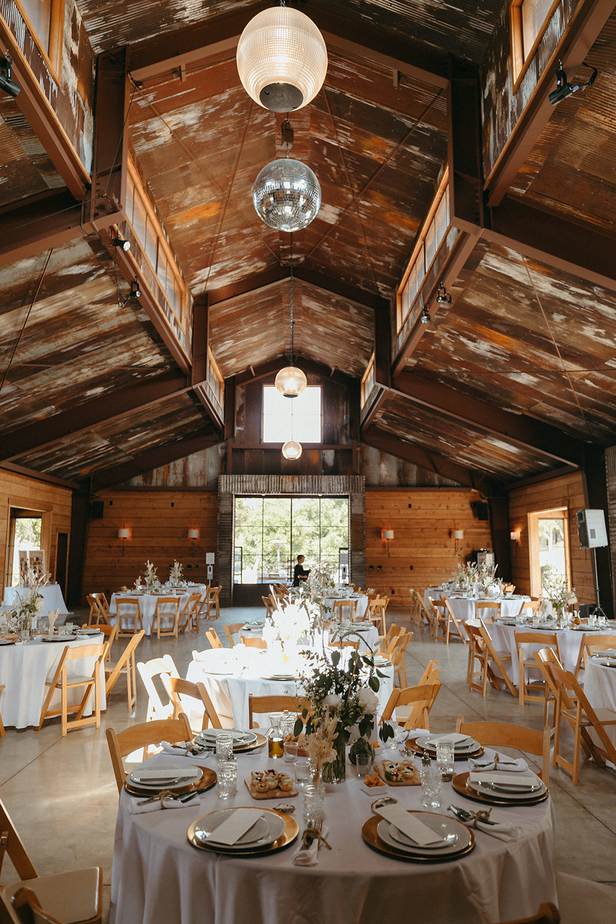 How to incorporate disco balls into your barn wedding