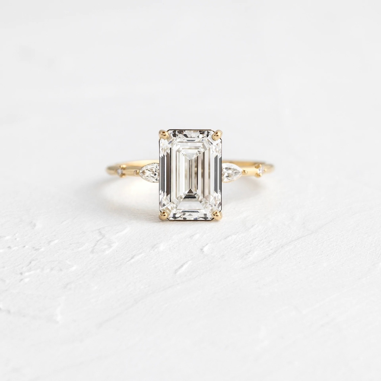 emerald cut gold engagement ring dupe for Naomi Biden