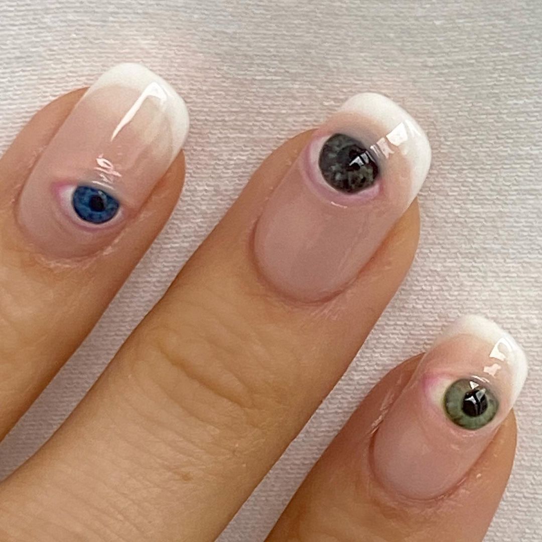 creepy something blue eyeball manicure
