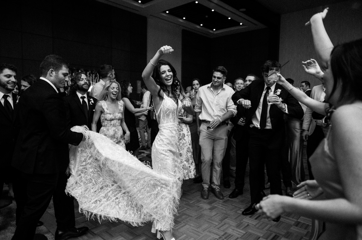 Wedding guests dancing to live music 