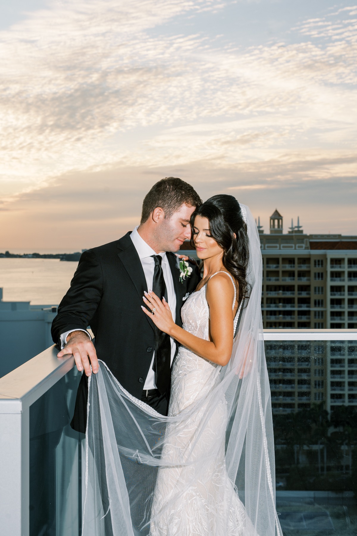 Sunset rooftop newlywed portraits