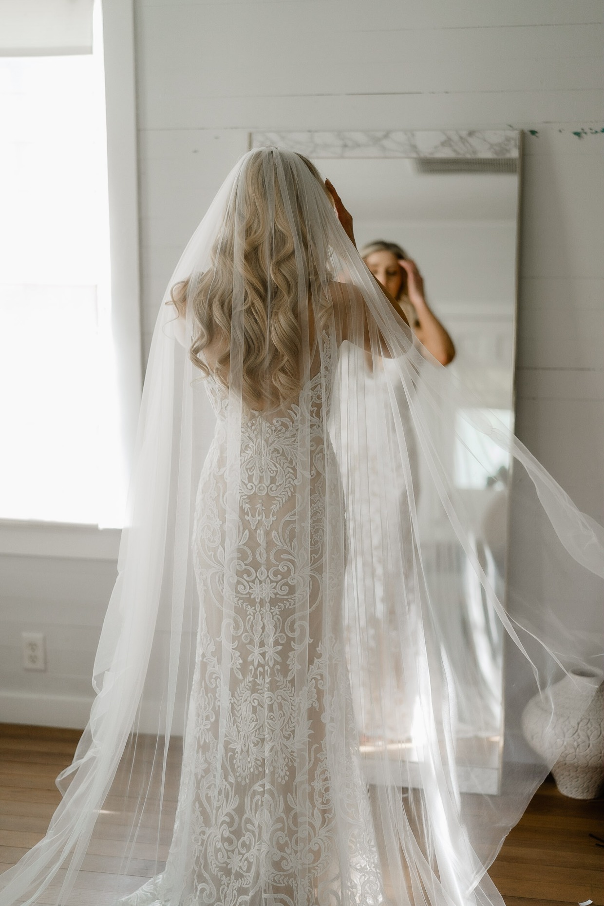 bride with long Hollywood curls