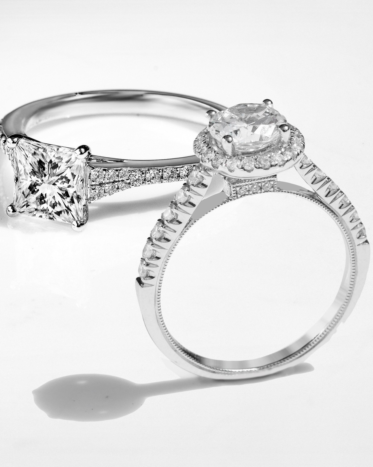 princess cut diamond engagement ring and solitaire ring with halo