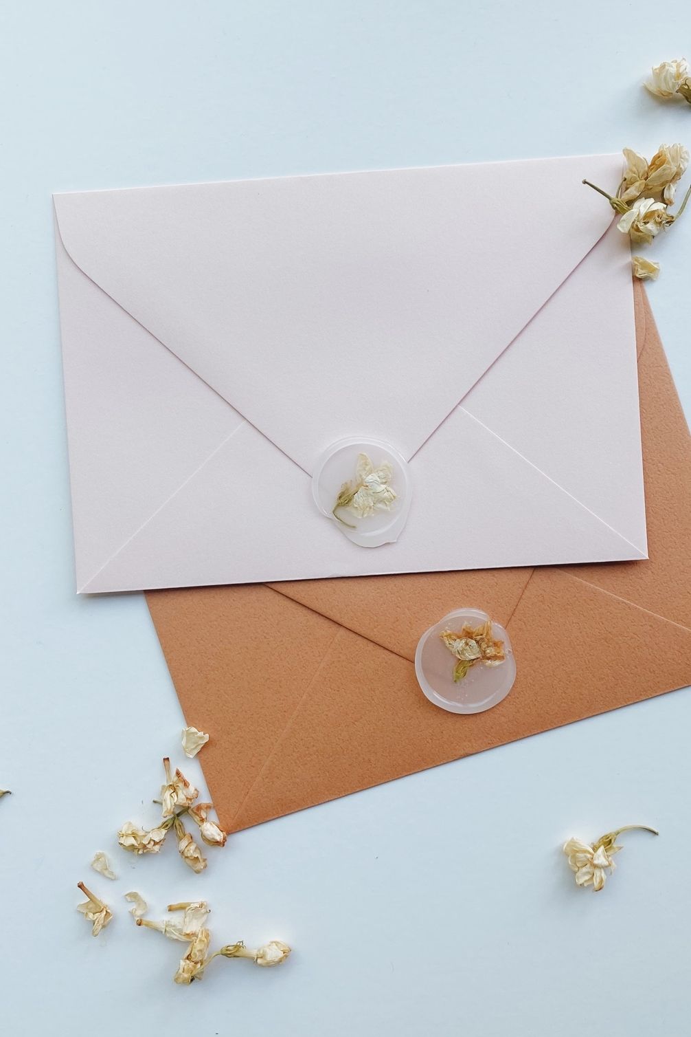 clear wax seal on envelope with dried flowers
