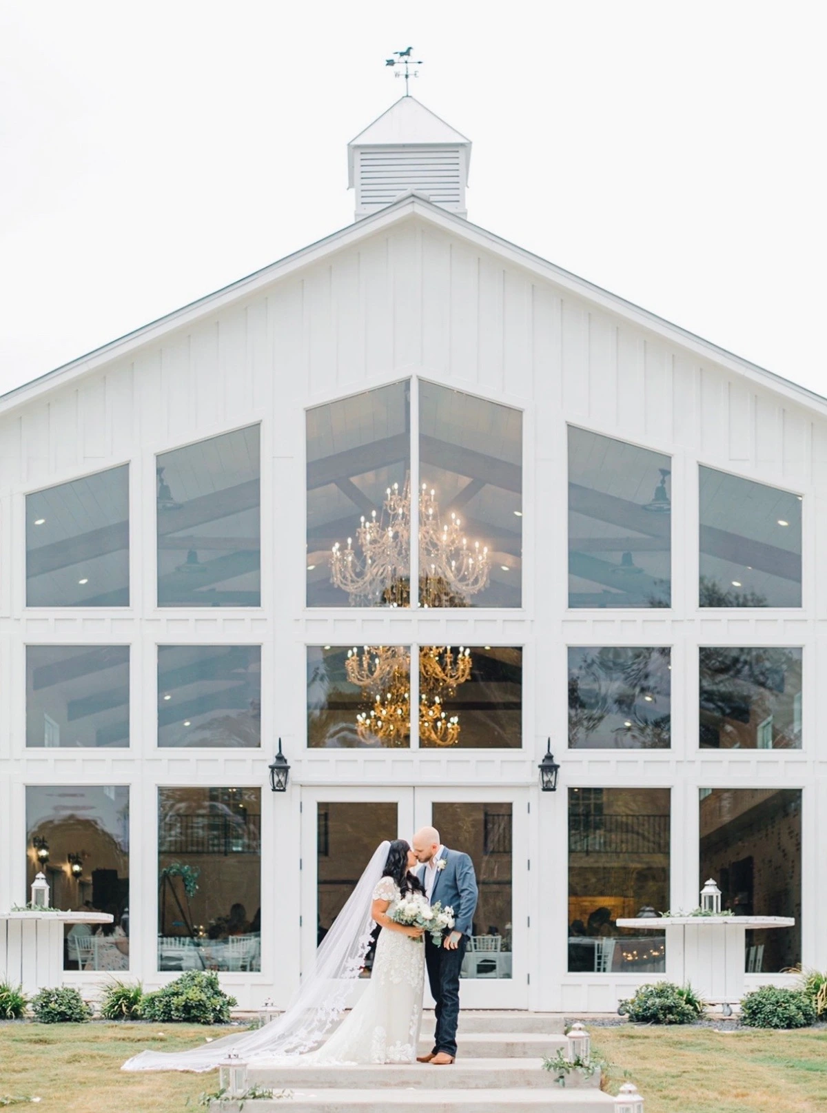 white farm wedding with chandeliers
