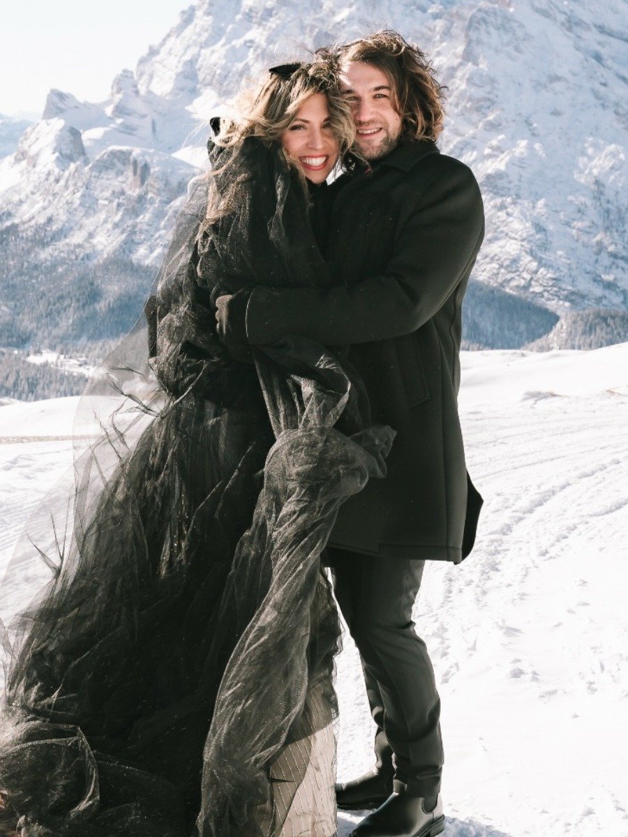 Moody winter elopement in Italy at Faloria Spa Resort