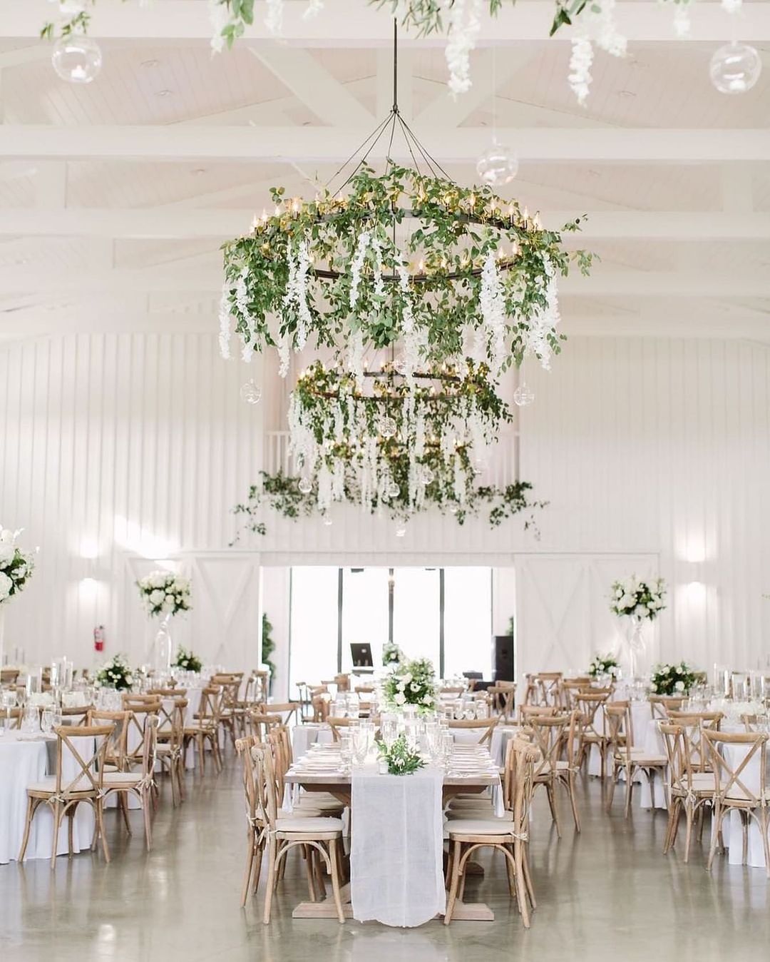 white barn wedding with floral chandelier