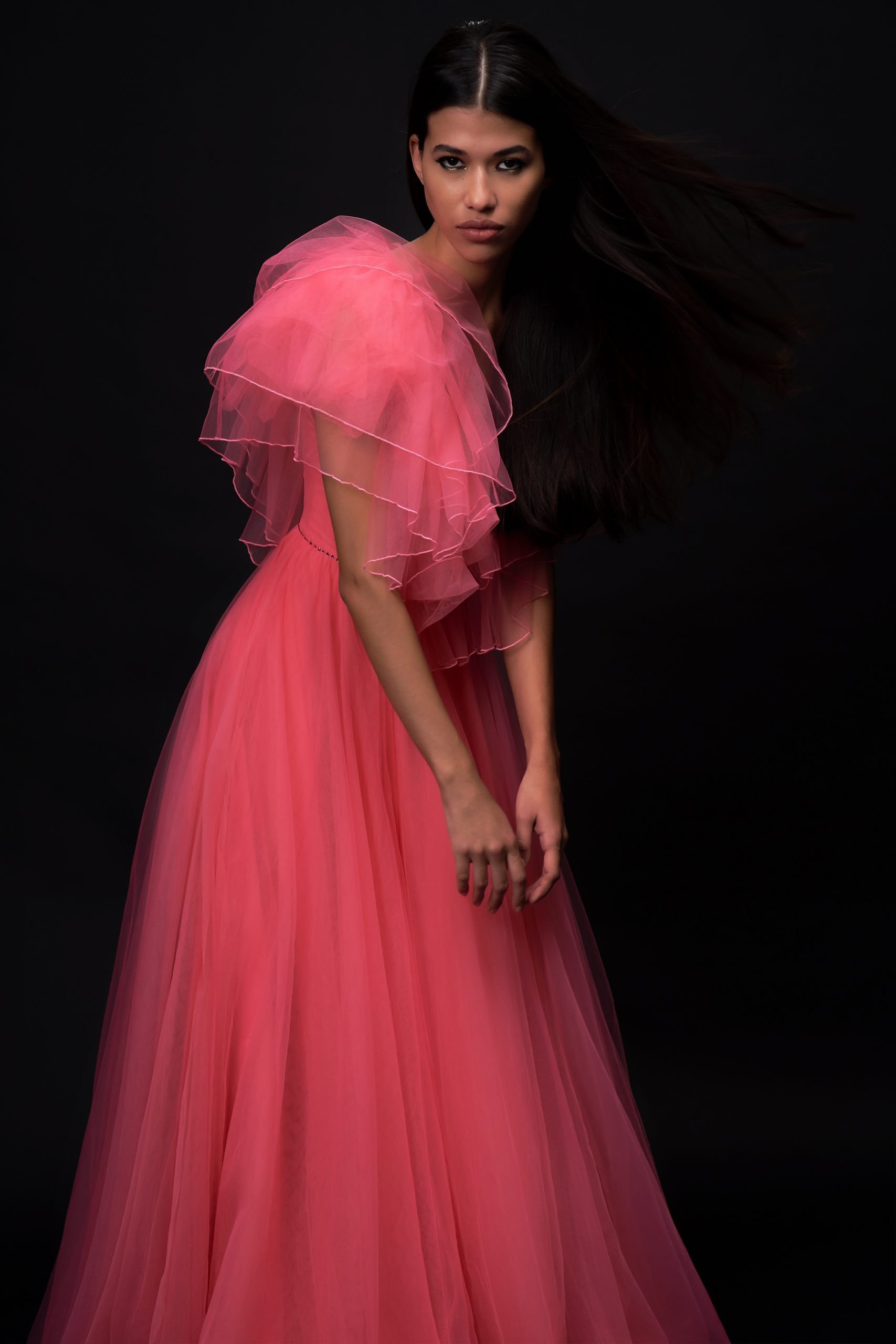 hot pink tulle gown with big flutter sleeves