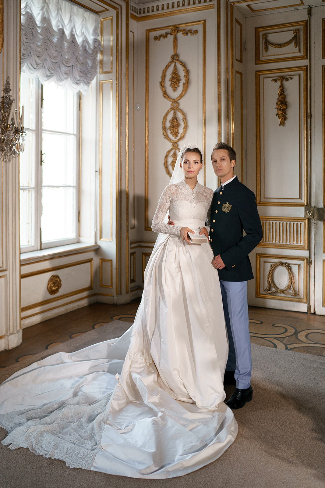 bride with groom in Grace Kelly wedding dress replica