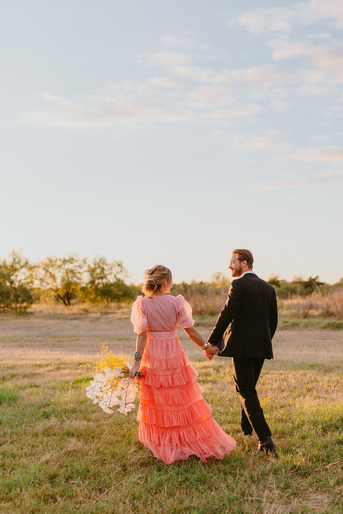 pink and peach ruffled wedding gown