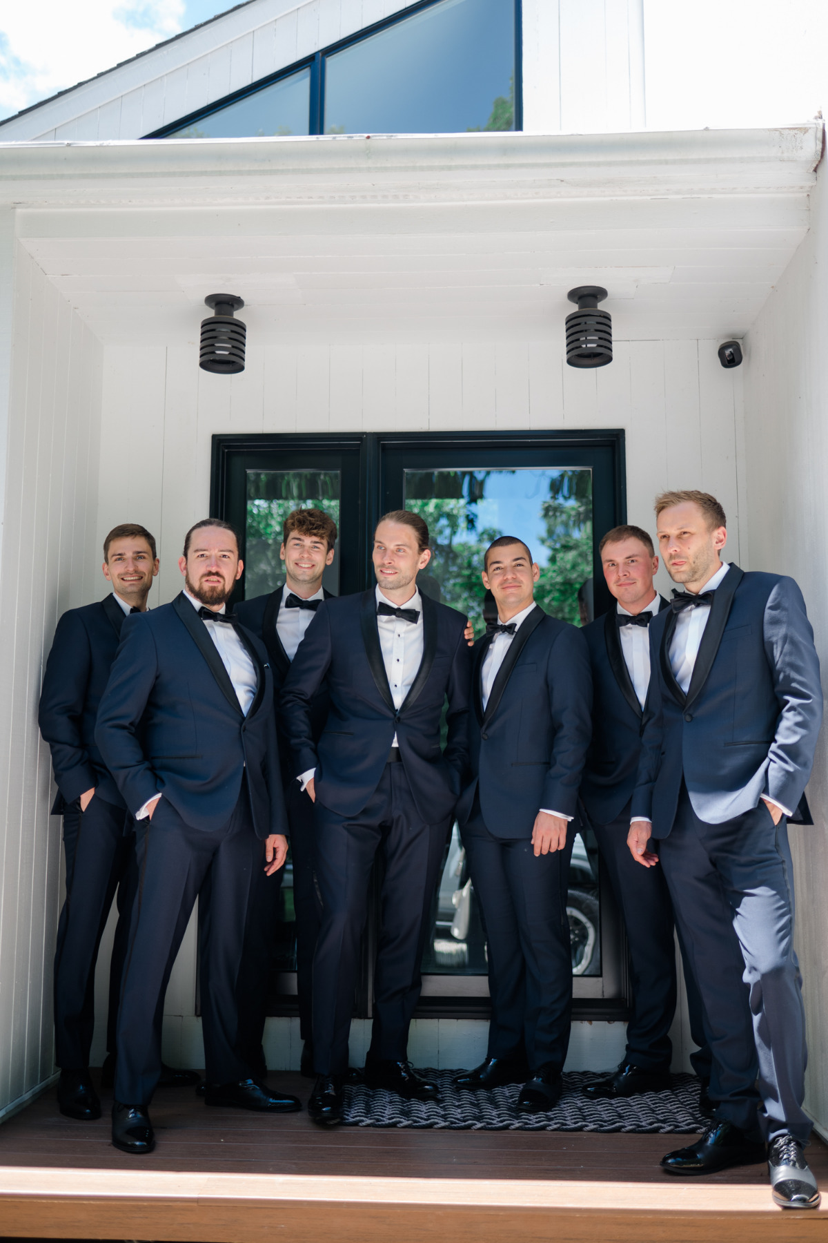 navy blue groomsmen suits with black accents