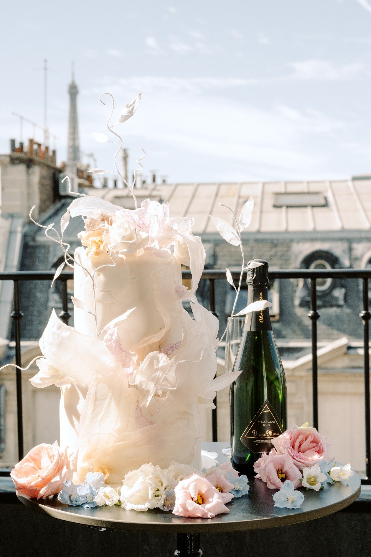 organic sculptural wedding cake in champagne and ivory