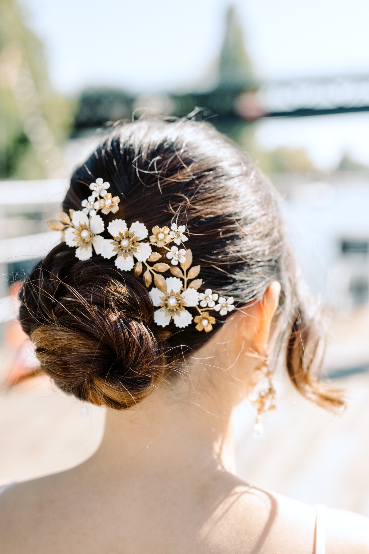 gold and porcelain floral comb with clean curled updo