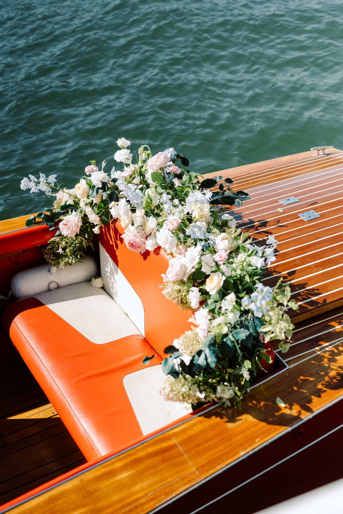 blush and blue floral arch on river boat cruise in Paris
