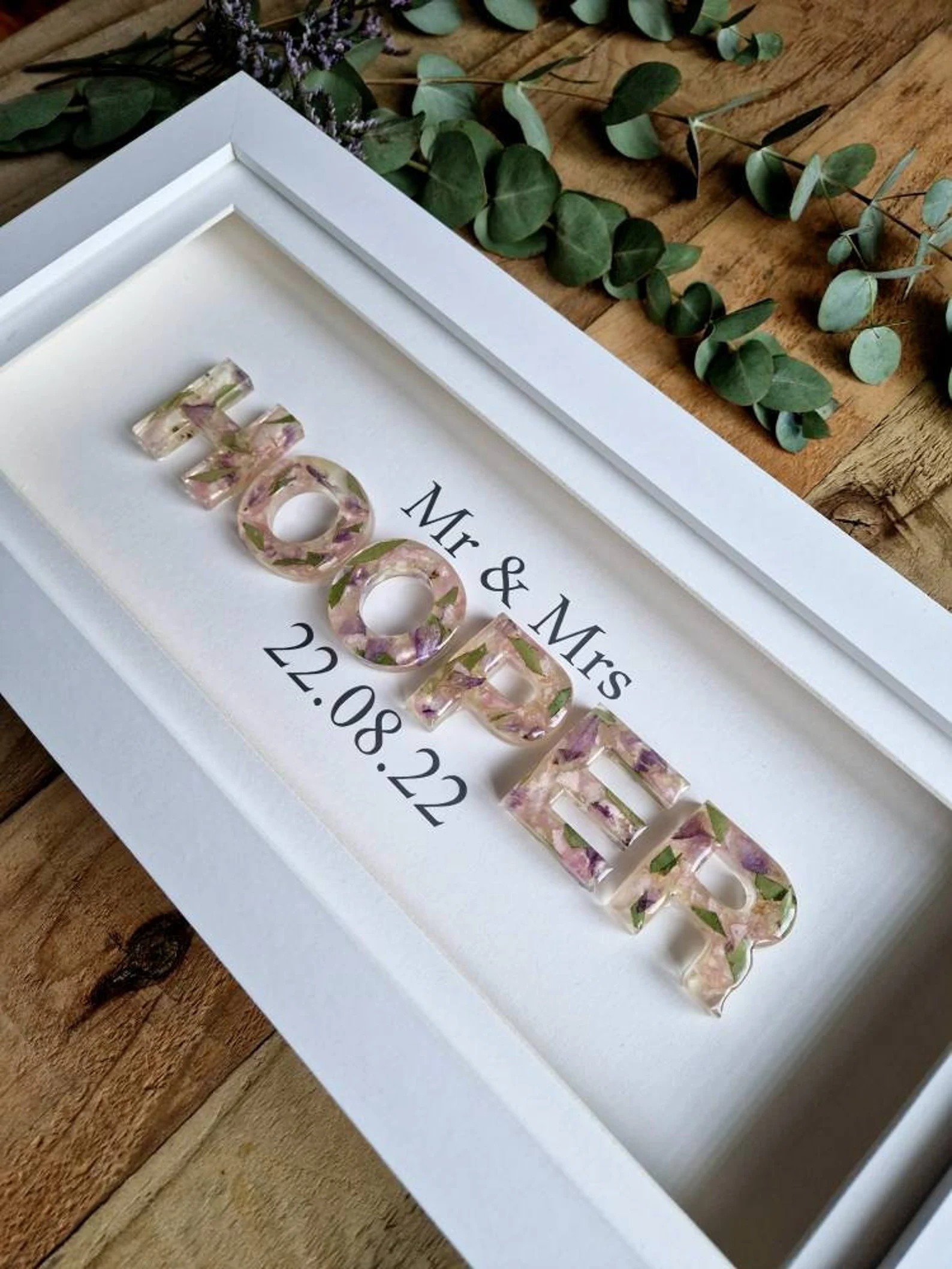 minimalist sign made from wedding flowers