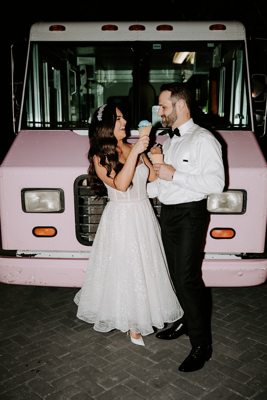 bride and groom have ice cream truck at wedding