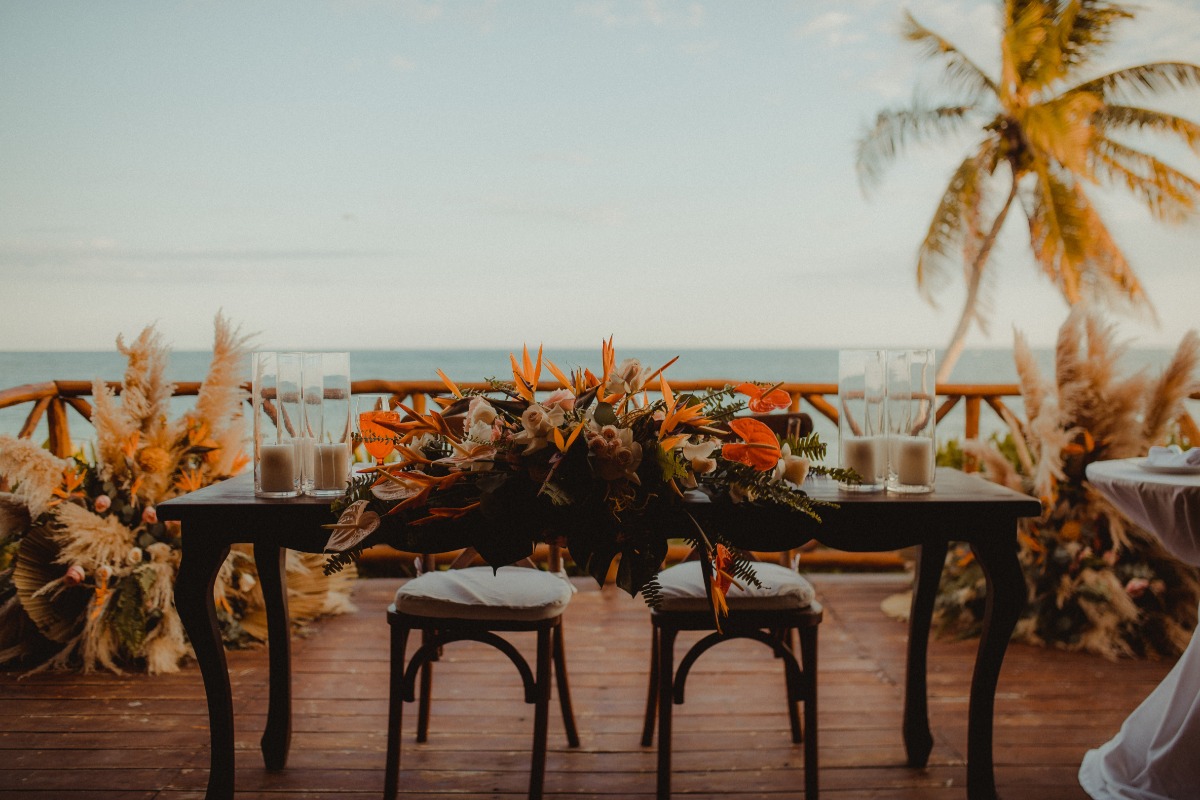 how to use palm fronds in your wedding arrangements