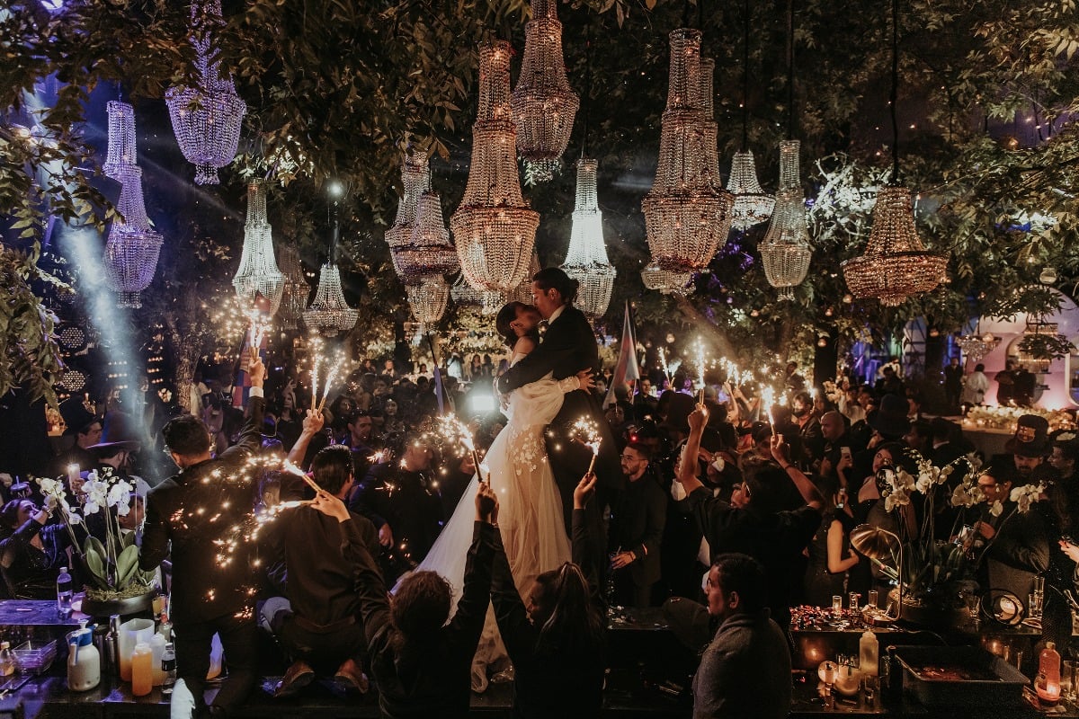 wedding reception with hanging chandeliers