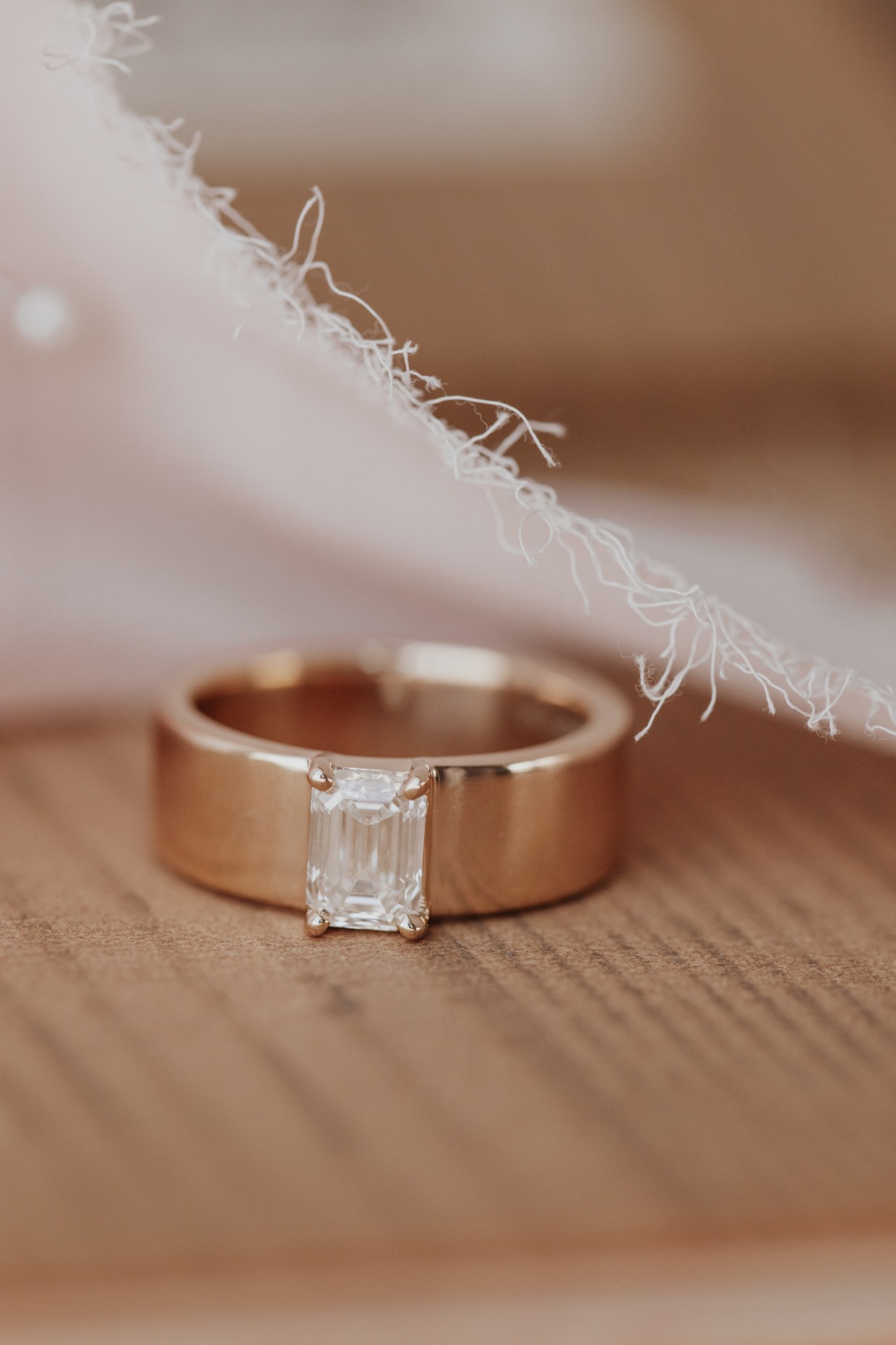 The Maya Emerald Cut Cigar Band Solitaire