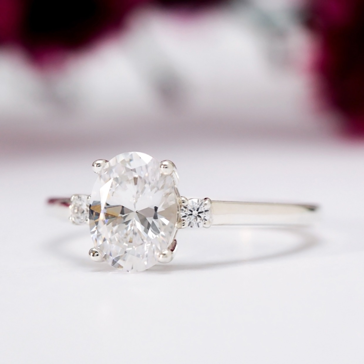 oval moissanite three stone ring by Vinny and Charles