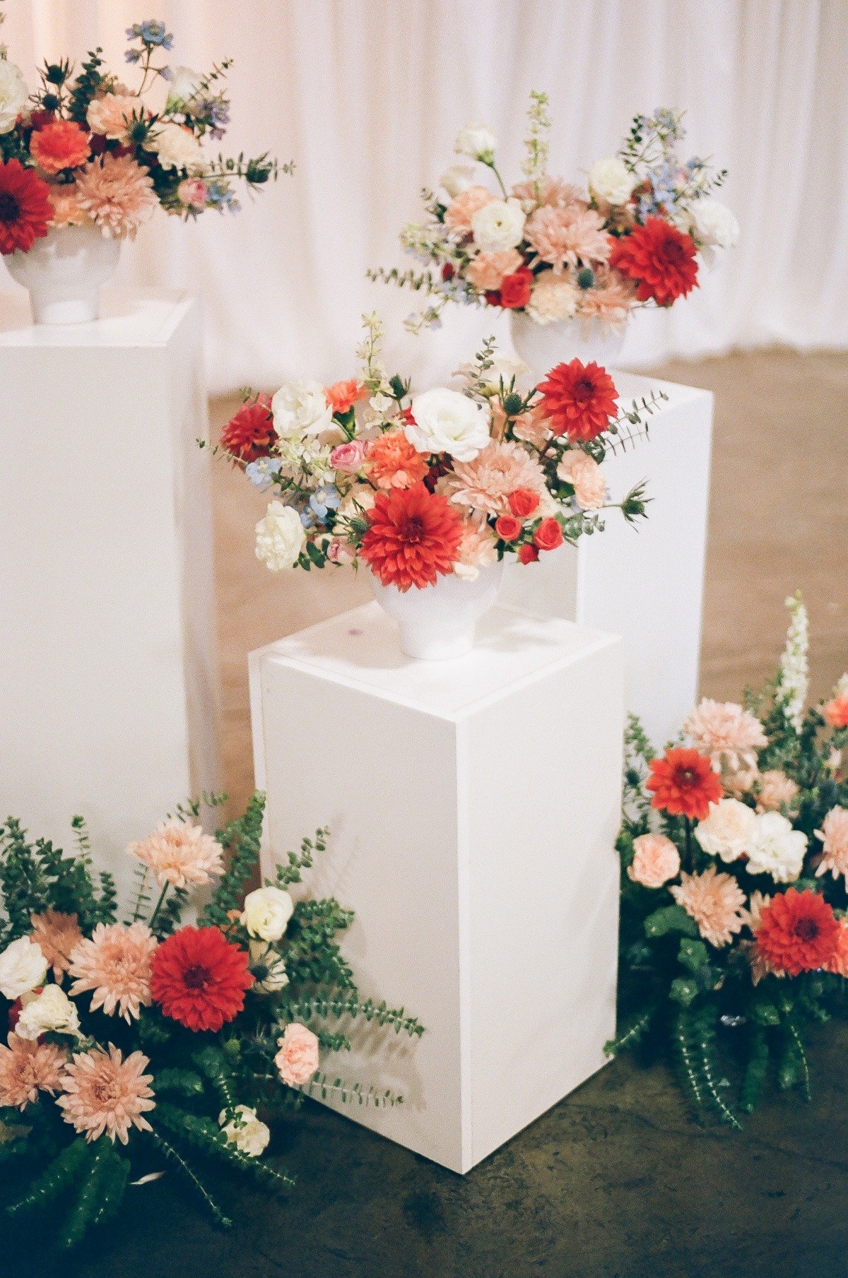 Pastel wedding ceremony flowers 