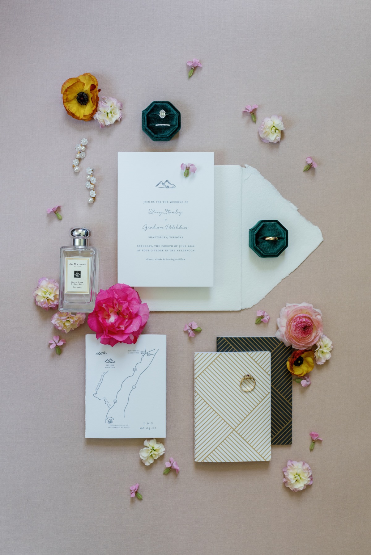 Jewel tone and floral invitation suite 