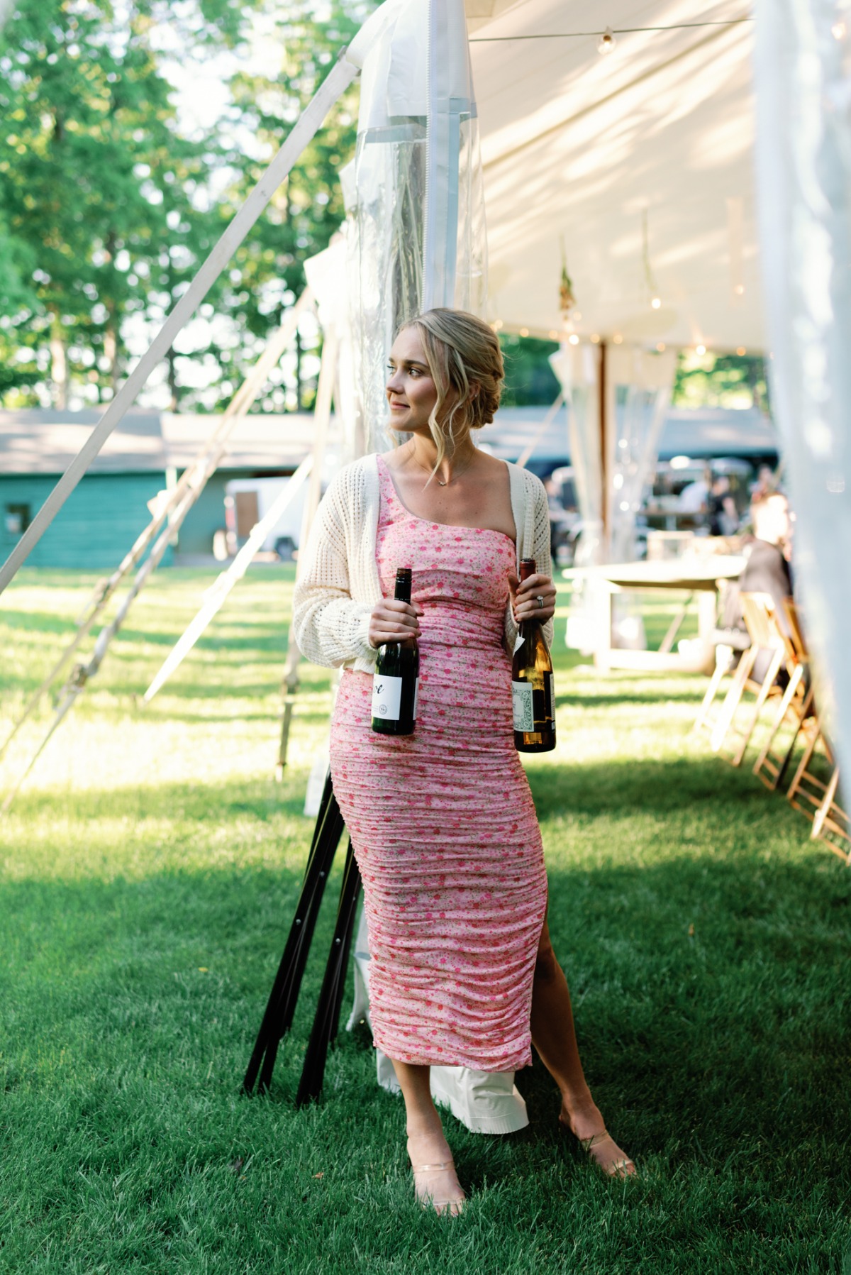 Playful pink bridesmaid with wine
