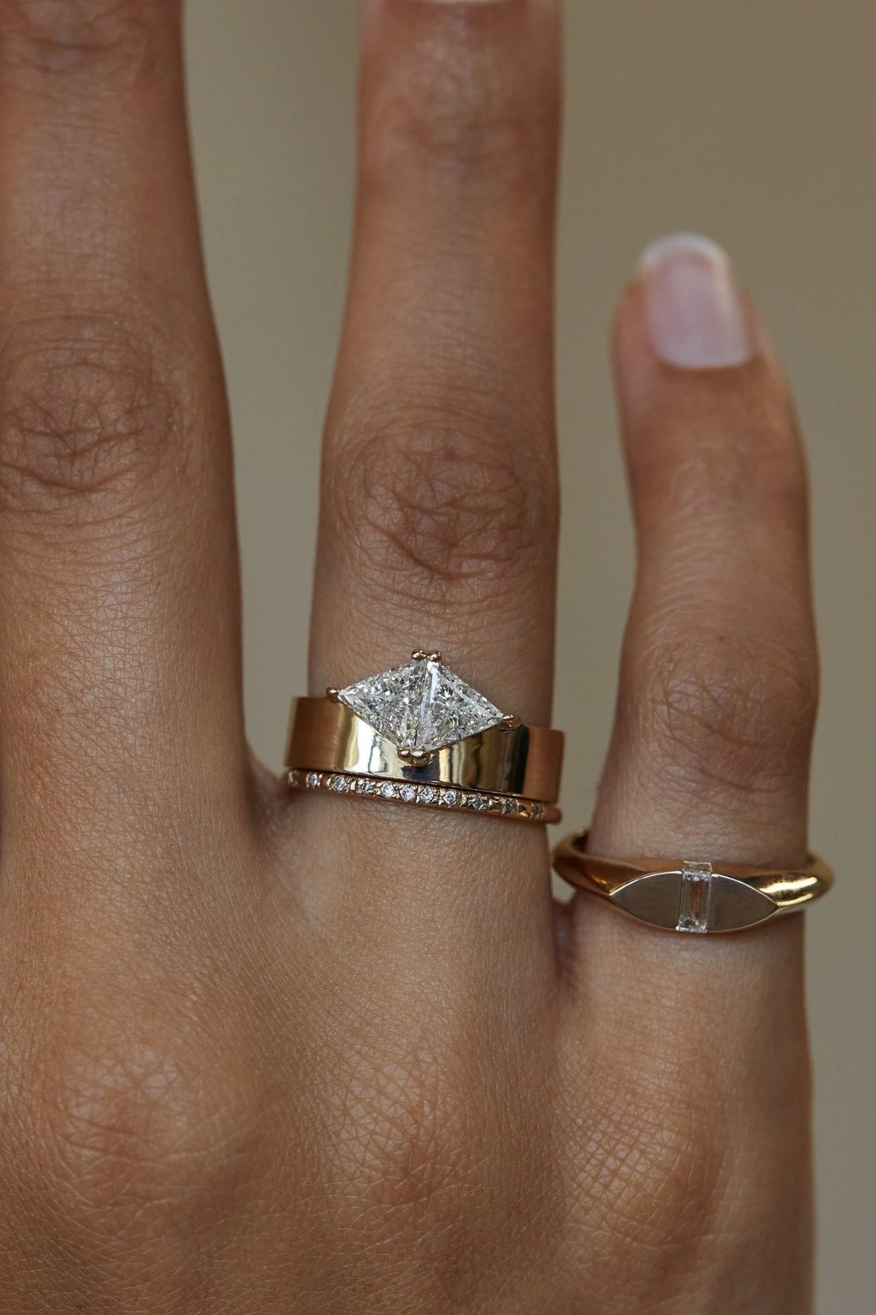 trillion cut diamond engagement ring with cigar band